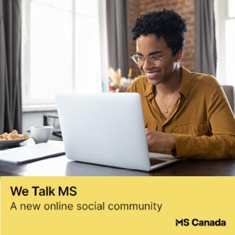 Person at laptop accessing online social community