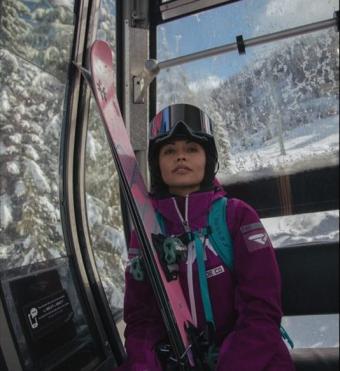 Imaan sitting in a gondola, ready to take on the hills