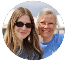 Two smiling women outdoors, one wearing sunglasses, circular cropped photo.