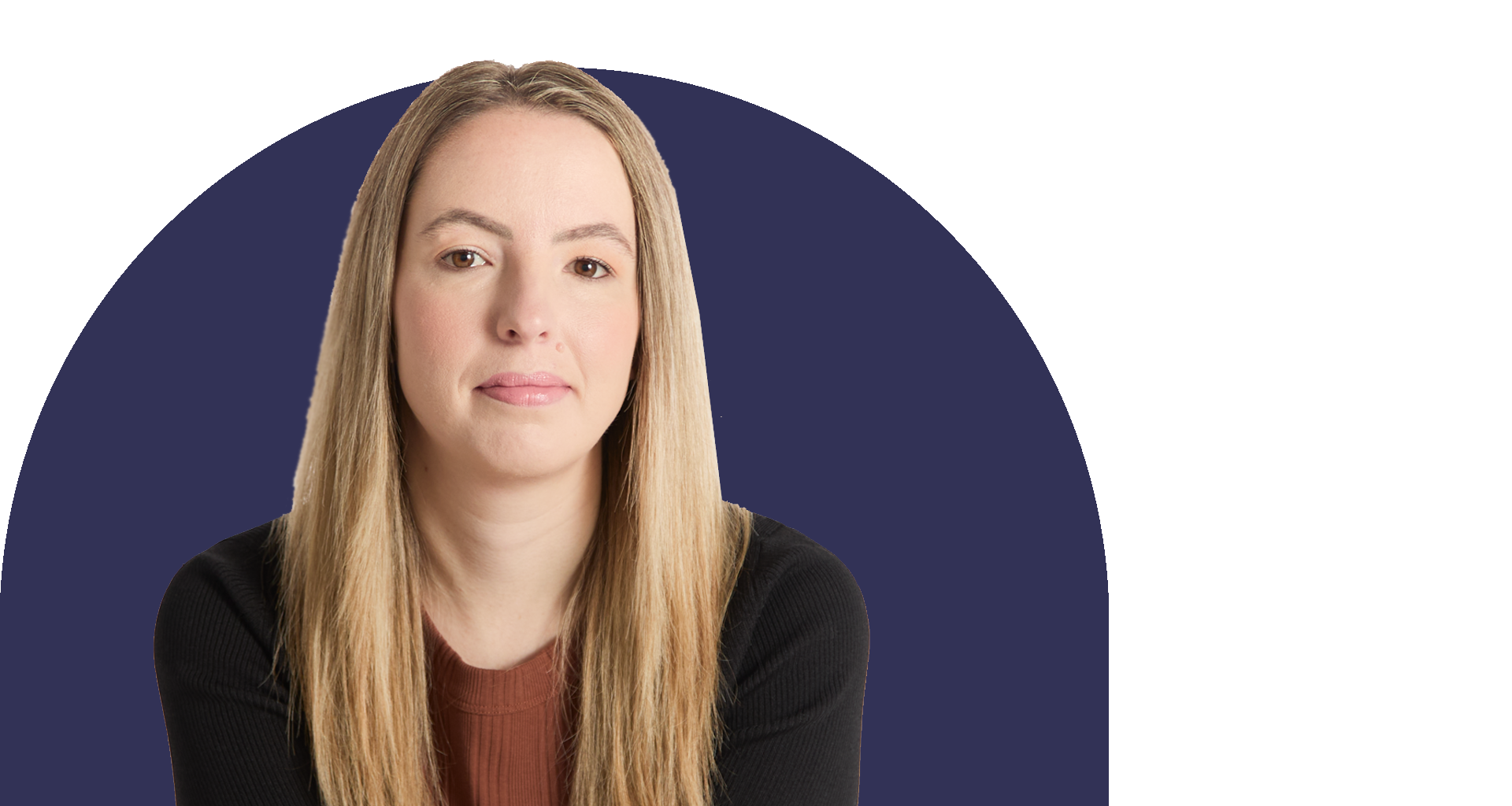 A woman with long blonde hair is wearing a brown shirt with a black cardigan.