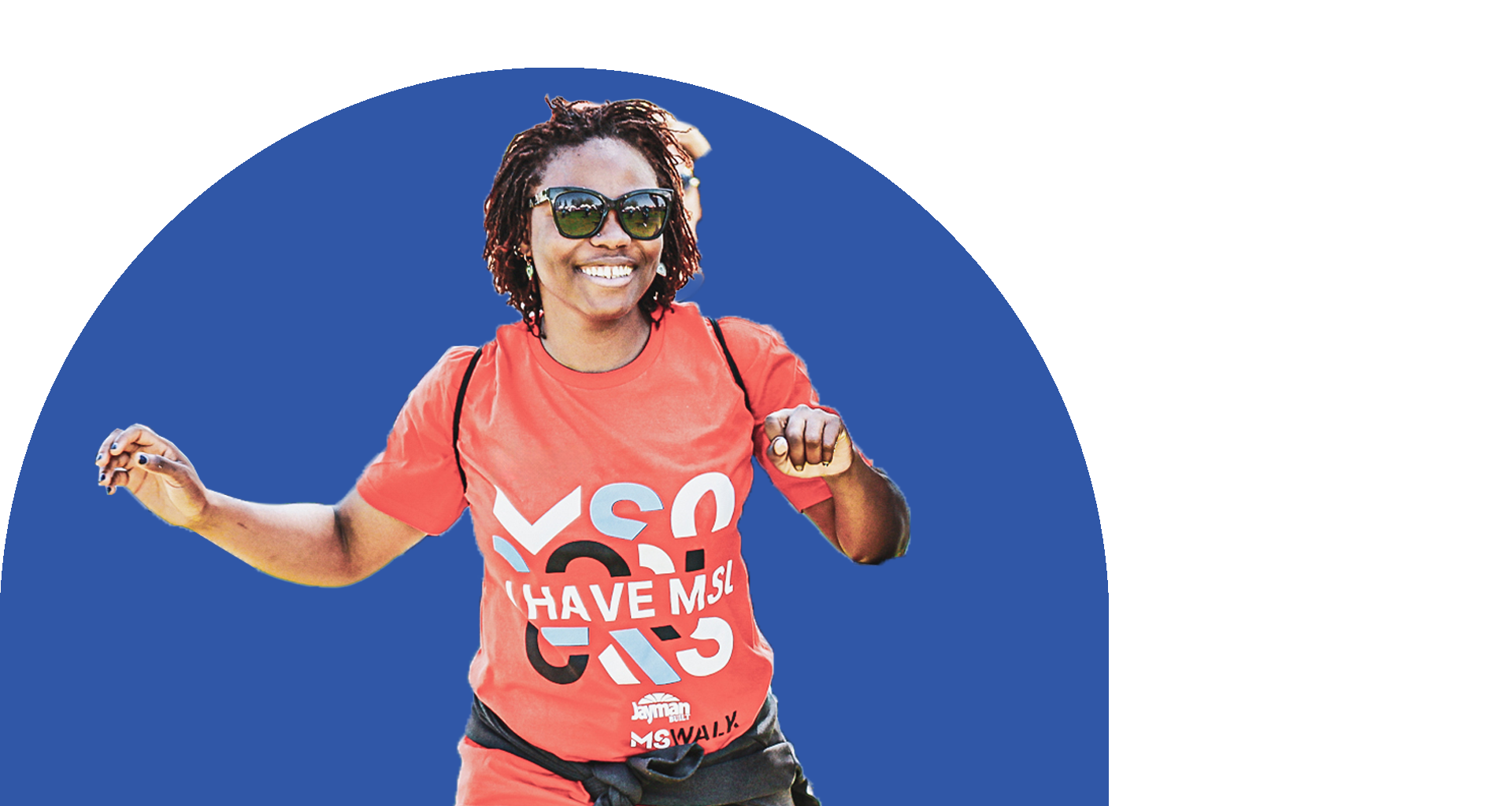 Joyful person in red "Yes Have It" t-shirt dancing, wearing sunglasses, against blue circle background.